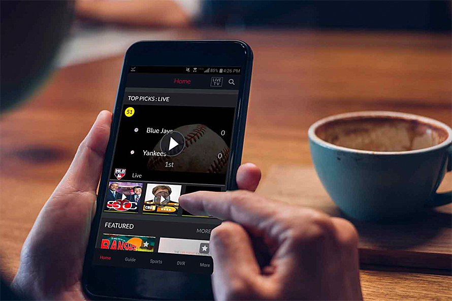Person using the DISH Anywhere app on their phone