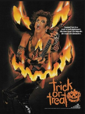 A heavy metal musicians emerging from a jack-o-lantern