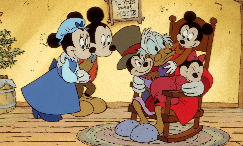 Scrooge McDuck sits happily surrounded by Mickey's family.
