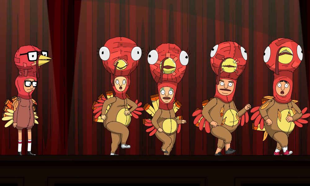 Tina, a cartoon girl with glasses, is wearing a turkey suit looking sadly at a group of her peers (also wearing turkey suits) while they dance and sing.