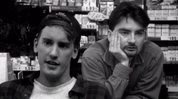 Randal (Jeff Anderson) and Dante (Brian Halloran) contemplate their private and professional lives in Clerks