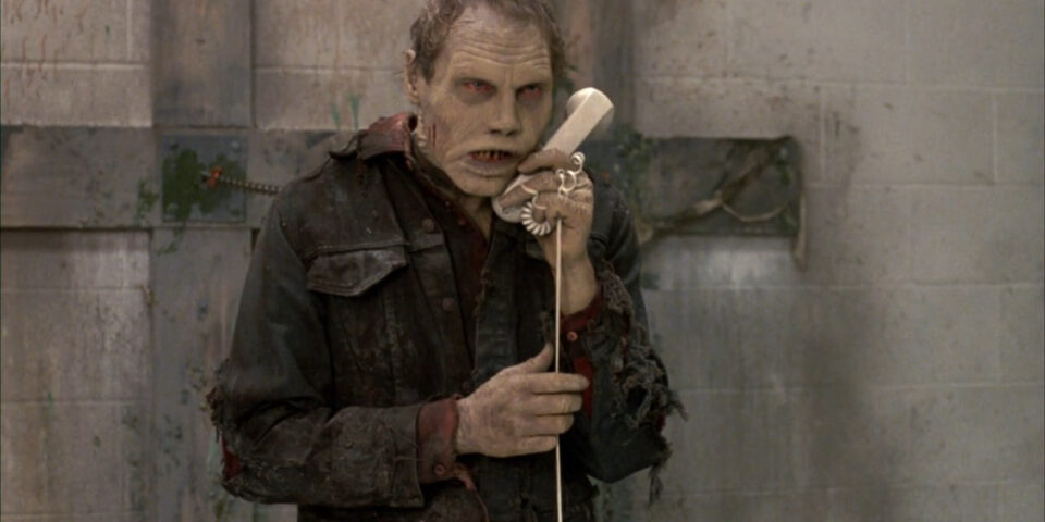 A zombie tries to remember how to use a telephone in Day of the Dead (1985)