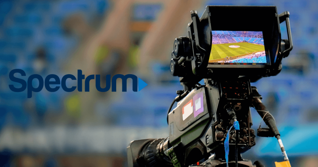 Video camera at sporting event with Spectrum logo