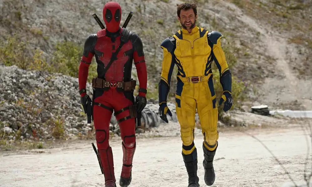 Deadpool, a masked anti-hero vigilante, walking beside unmasked Wolverine.