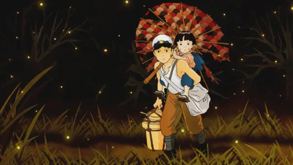 A young man in a military hat carries a child on his back.