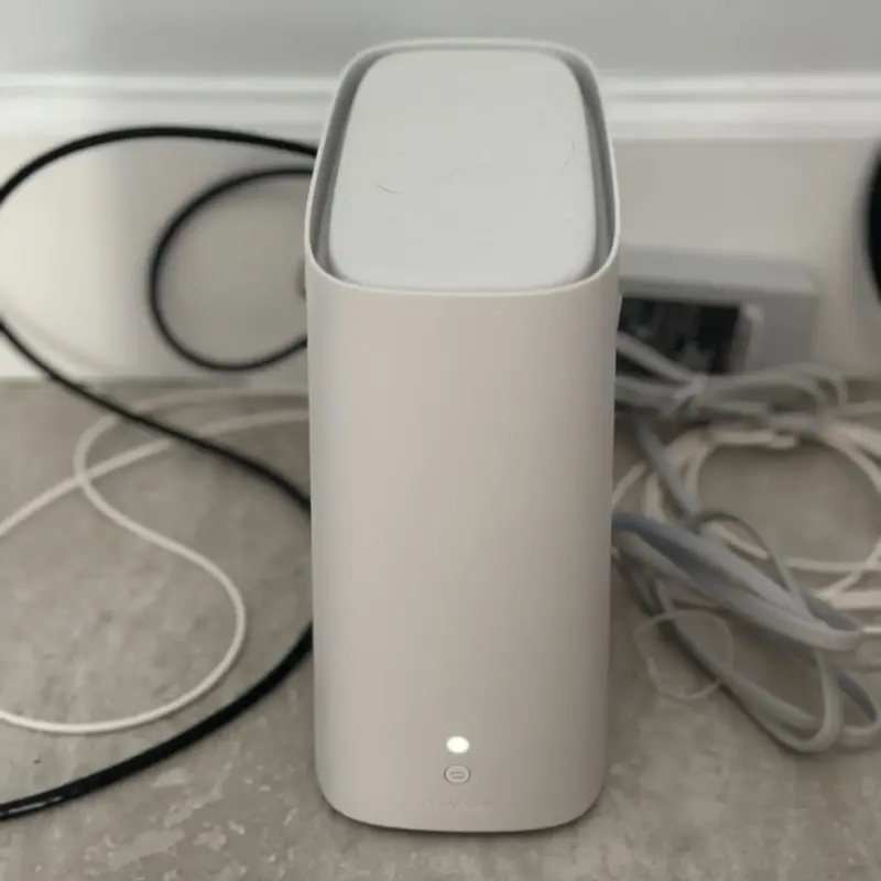 A photo of AT&T's Wi-Fi gateway device for fiber internet customers. It's a small white box connected to the internet.