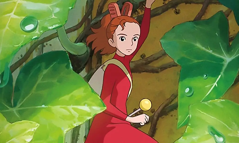 An animated girl with a red ponytail and red hair. She is very small and surrounded by large leaves.