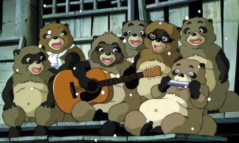 A group of racoon bears happily sing a song while one of them plays guitar.
