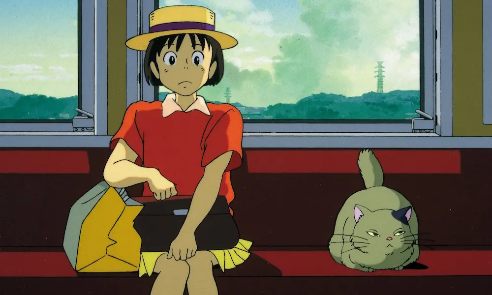 An animated girl with short hair and a straw hat looks uncomfortable or a train next to a cat.