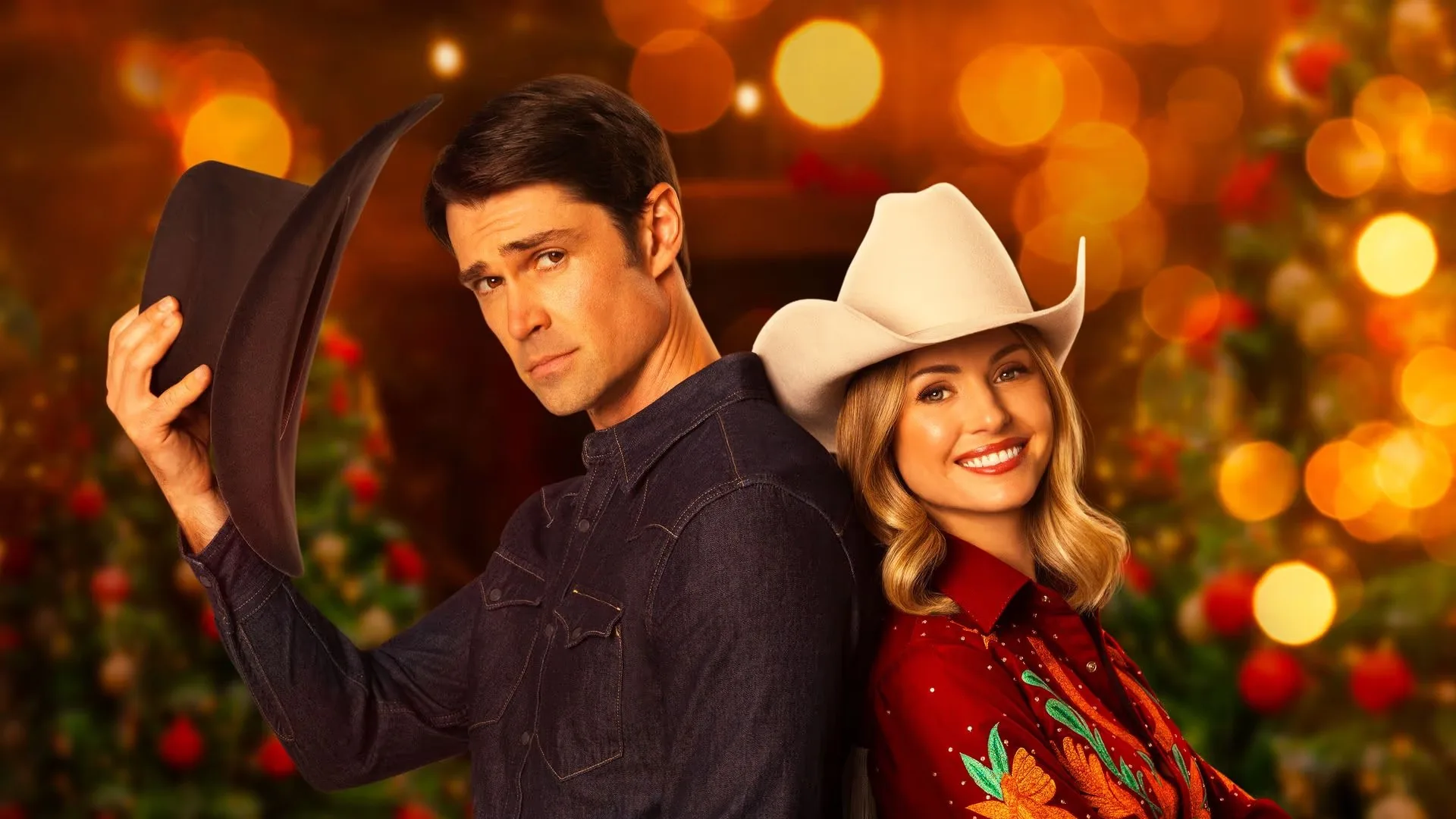Lifetime and Hallmark Christmas Movies - Rodeo Christmas Romance A scene from the Lifetime Christmas Movie, A Rodeo Christmas, shows a man and a woman standing back-to-back. The man is doffing his cowboy hat.