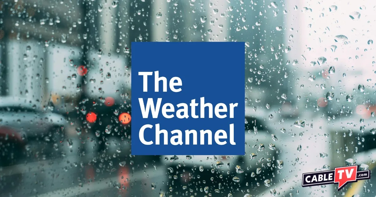 Window with raindrops looking at a city street with The Weather Channel logo