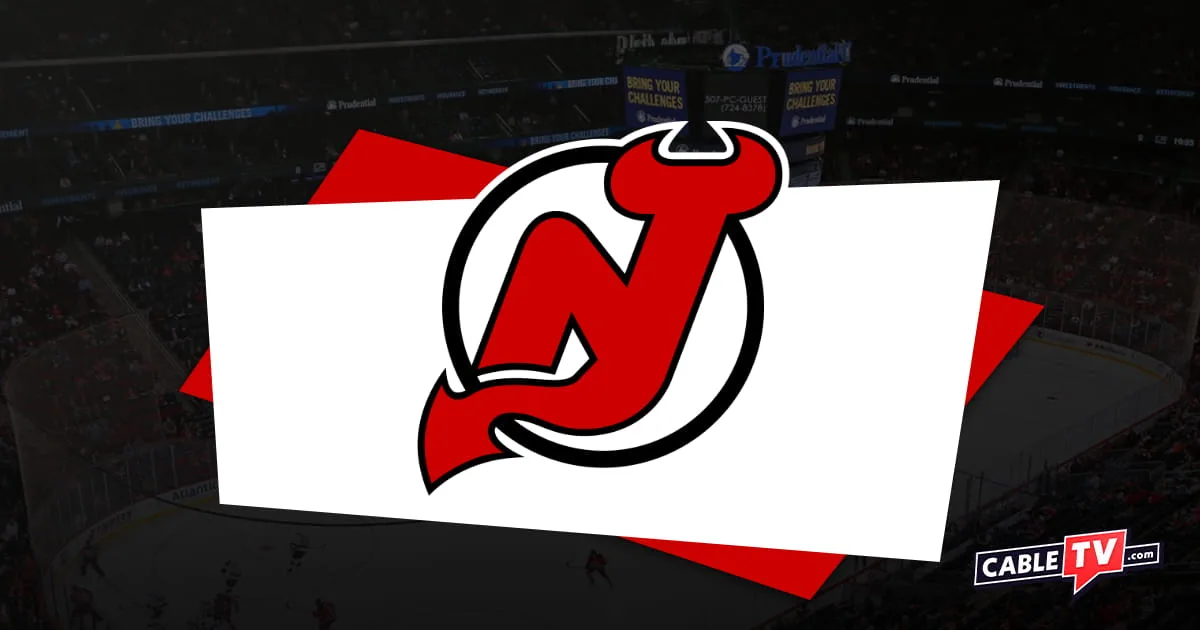 New Jersey Devils logo featuring a red N and J combined into one character with horns at the top and a pointy tail. CableTV.com logo in bottom corner and hockey rink in shadow as background