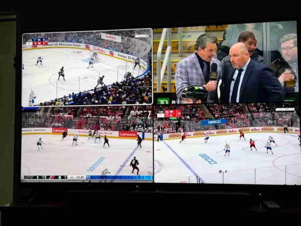 ESPN Unlimited Multiview A television showing four different broadcasts of National Hockey League games at the same time.