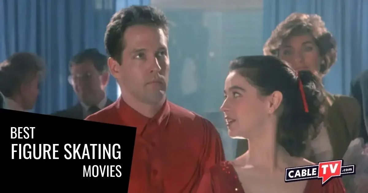 A figure-skating couple banters while awaiting their turn to skate.