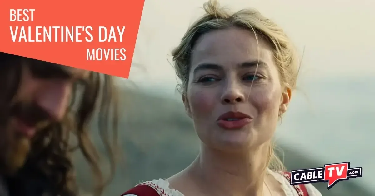 A closeup shot of a man (out of focus) and a woman chatting outdoors. The woman appears to be teasing the man. It's a scene from "Wuthering Heights" one of the 5 Best Valentine's Movies in 2026.