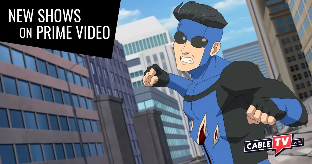 A battle-scarred cartoon superhero throws a punch on a city street.