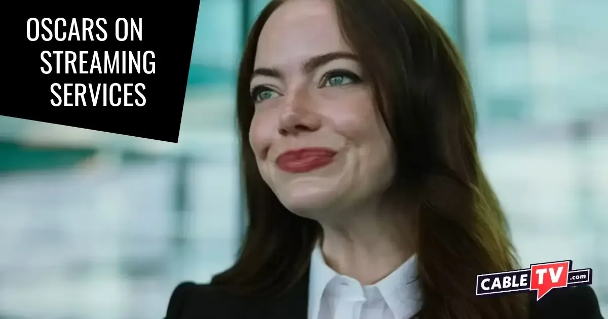 Oscars by Streaming Service - Bugonia A professional woman smiles in a glass-enclosed conference room.