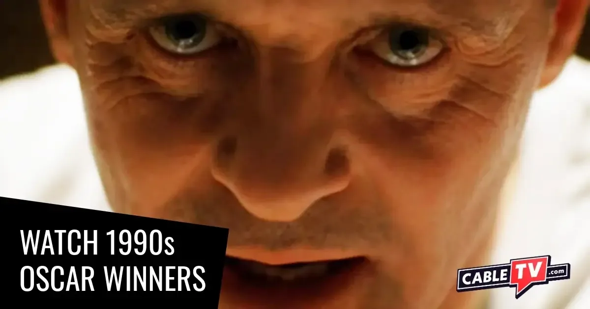 An extreme close-up of a leering older man.