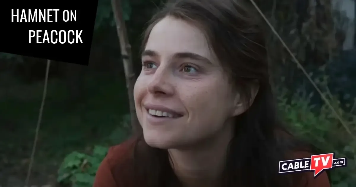 A close-up shot of a woman smiling lovingly.