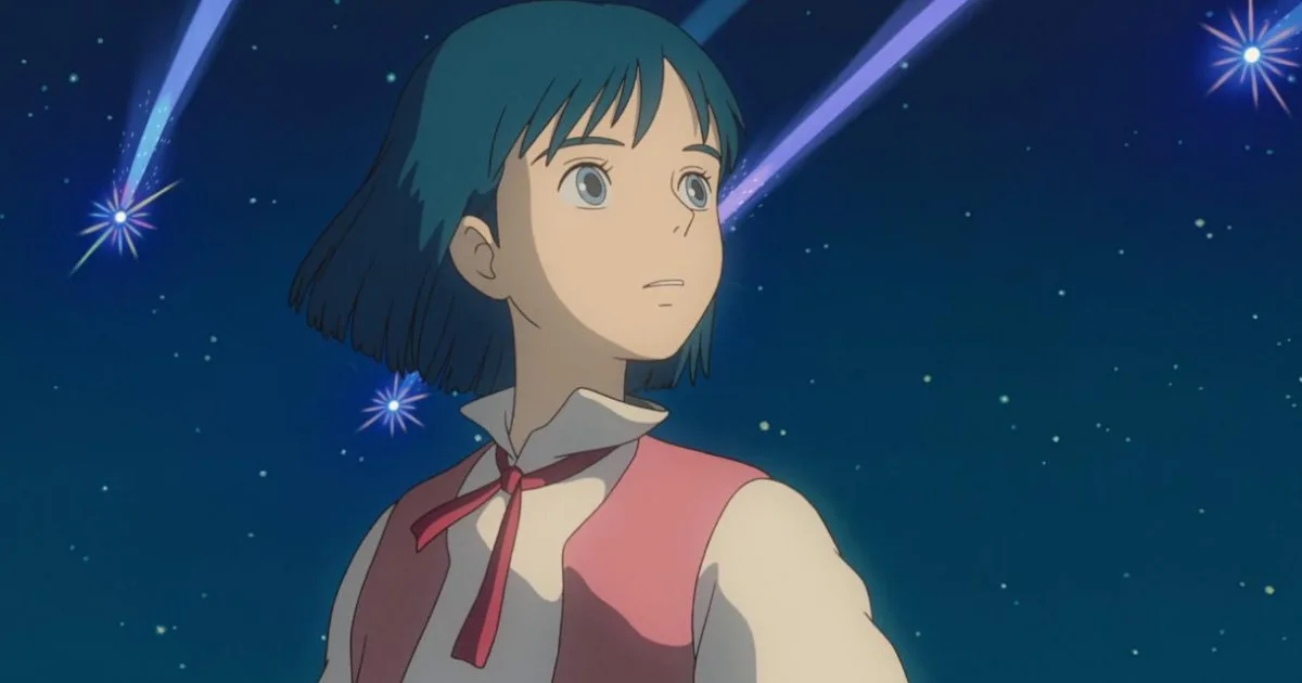 HowlsMovingCastle1200x630 A young anime boy looks up at falling stars.
