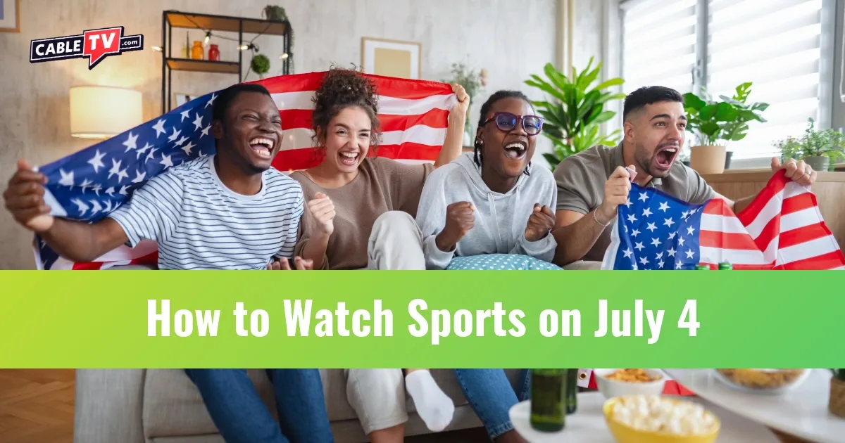 Fans holding American flags while watching tv and cheering
