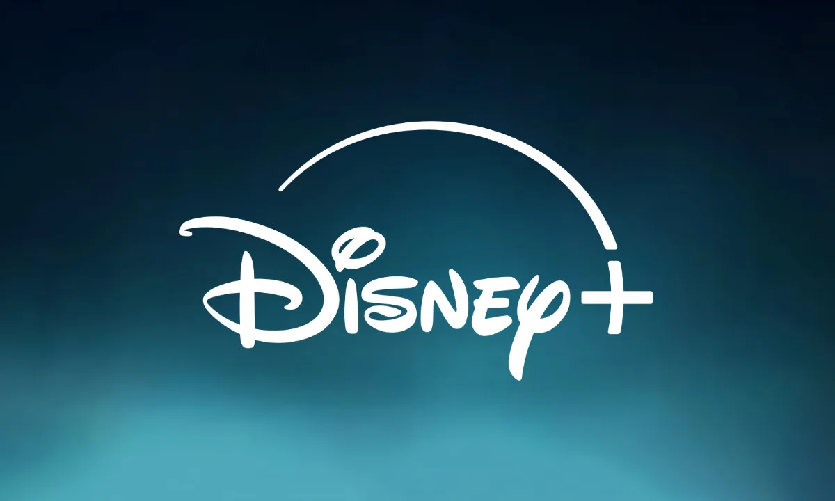 Disney+ Logo The Disney Plus logo on a vibrant teal-green background.