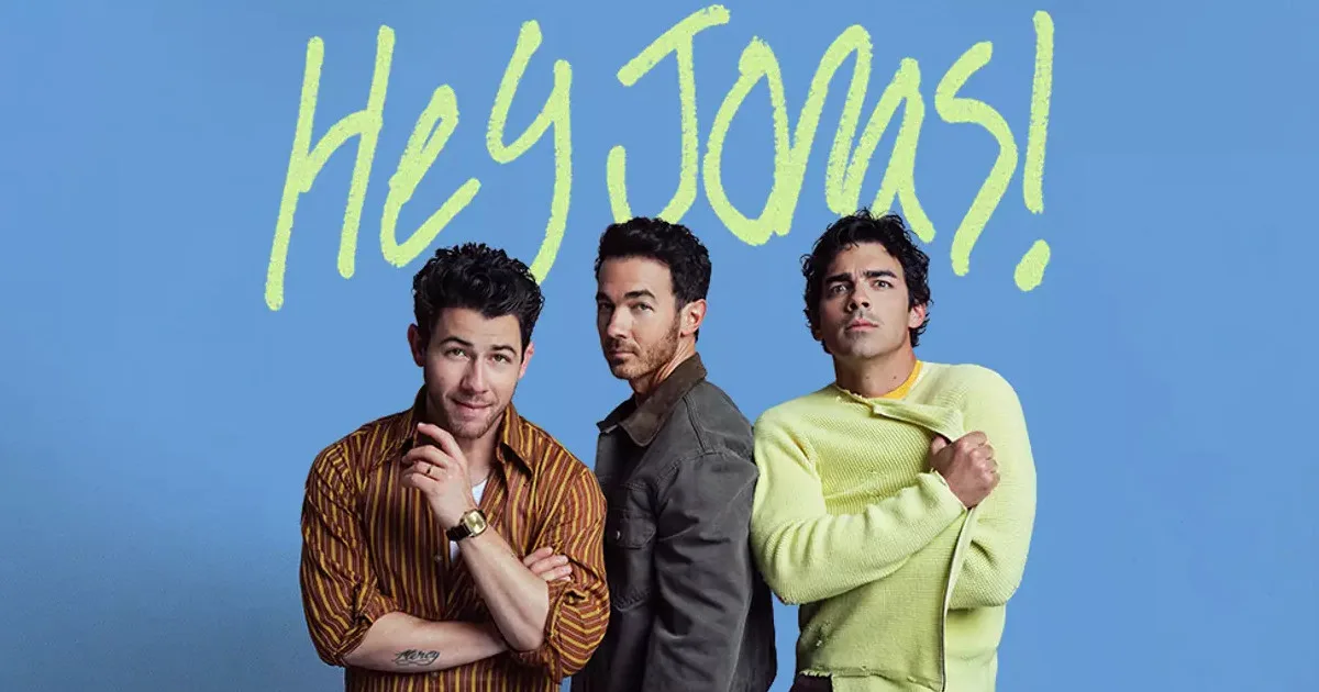 HeyJonas1200x630 "Hey, Jonas!" in a handwritten yellow/green font above a picture of Nick, Kevin, and Joe Jonas.