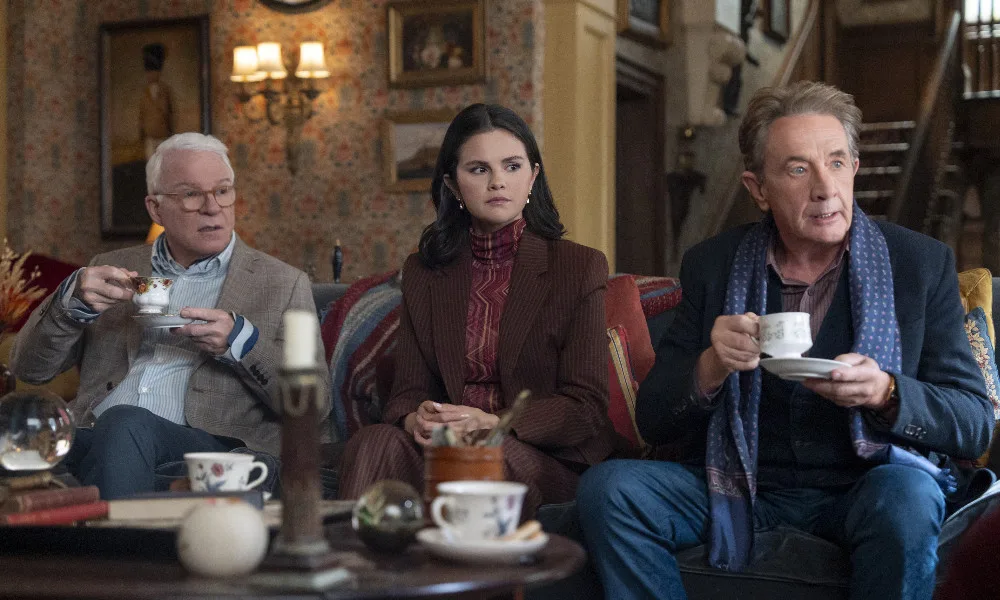 OMITBS6_1000x600 Charles, Mabel, and Oliver look shocked at something someone offscreen is telling them over tea.