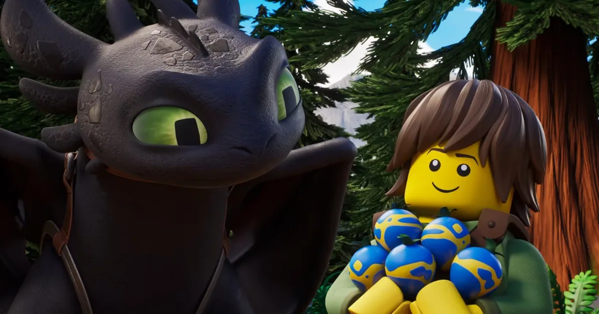 Toothless, a black dragon, stands next to a Lego version of Hiccup, a boy with brown hair, who is holding a pile of strangely colored orbs.
