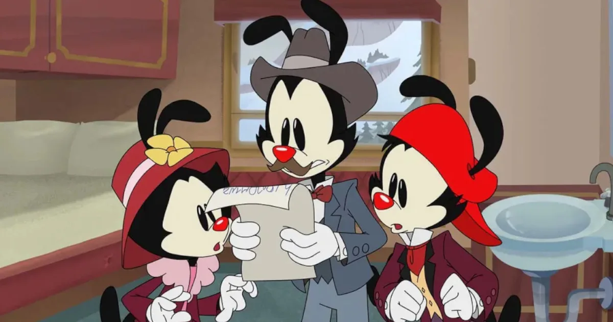 Three cartoon characters (Yakko, Wakko, and Dot Warner) look at a letter with shocked expressions.