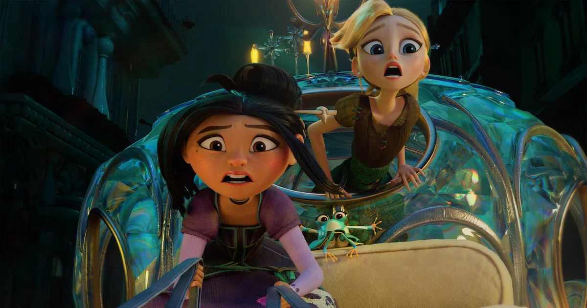 Two girls, one a "wicked stepsister" and one Cinderella, look scared as they ride in a carriage. There's also a terrified frog (the other stepsister, transformed).