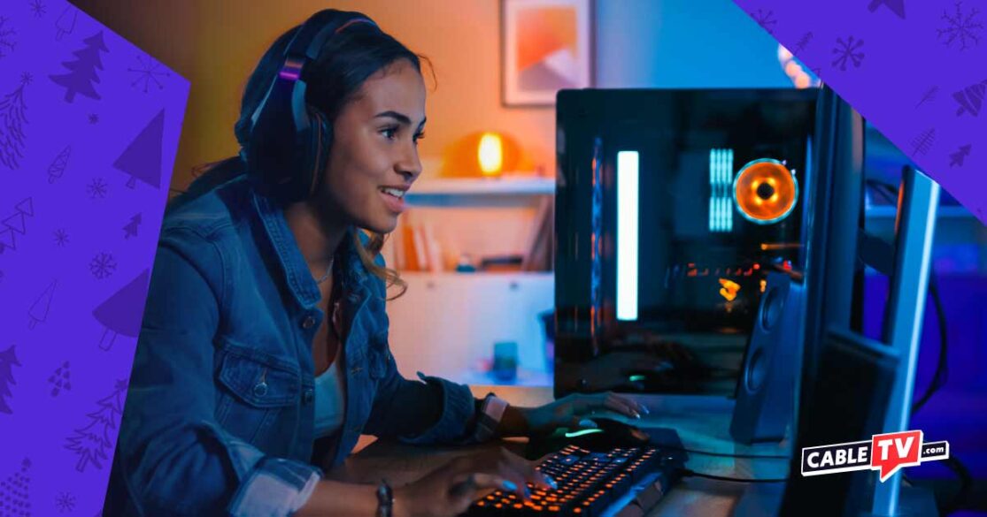 Woman young wearing a headset gaming on a PC computer