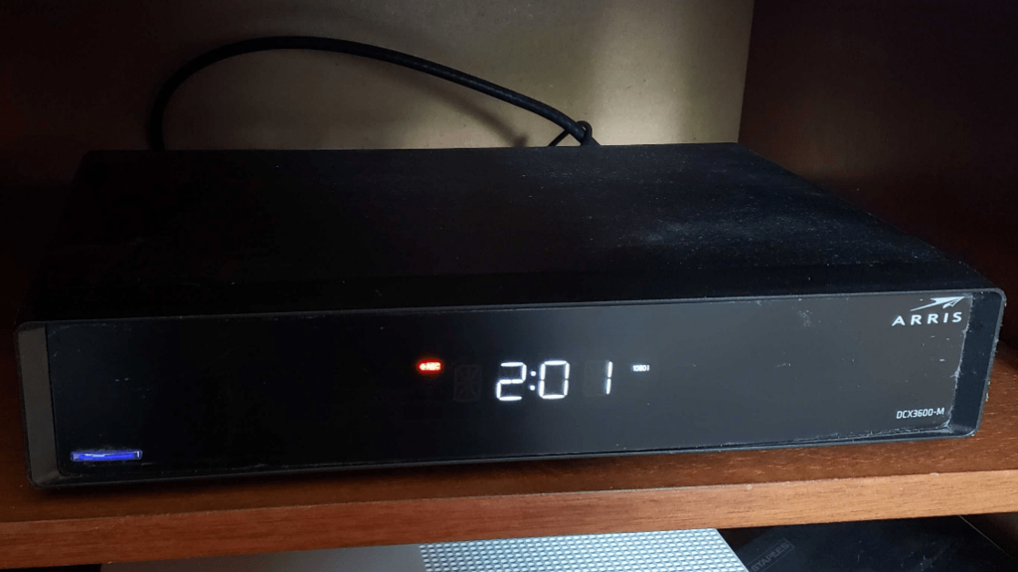 Spectrum Arris DVR device on a shelf