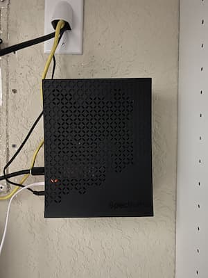 An in-home photo of Spectrum's modem