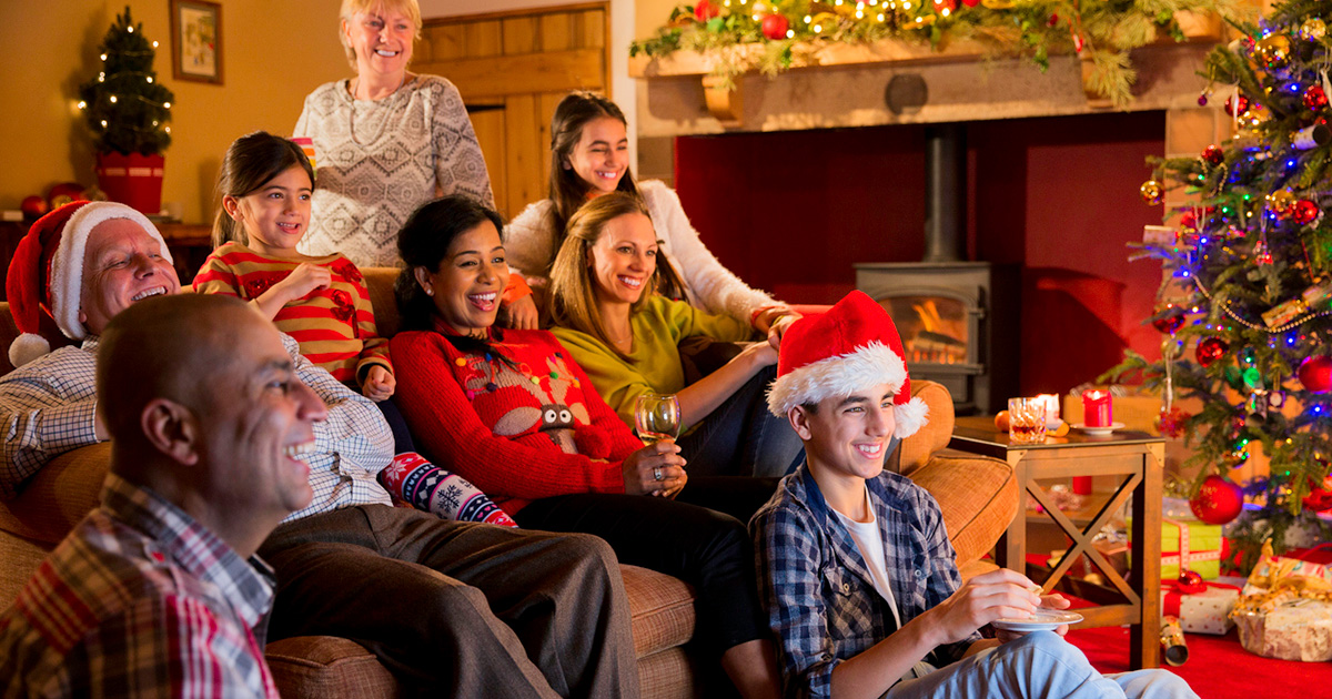 Family at Christmas watching TV
