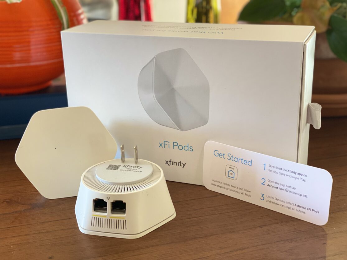 Xfinity xFi Pod and its packaging.